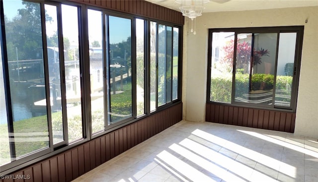 unfurnished sunroom with a healthy amount of sunlight