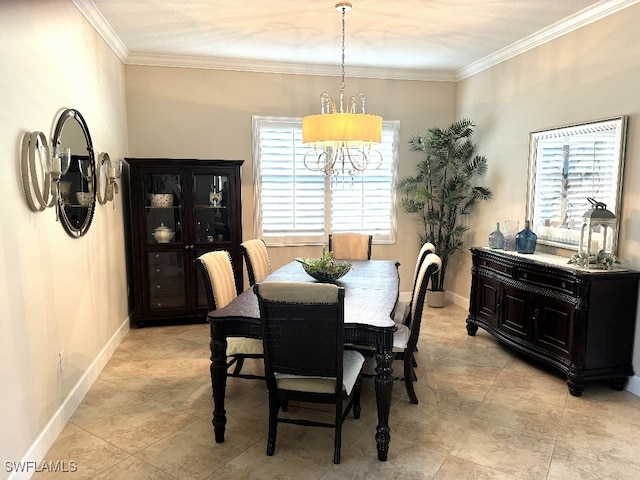 dining room with a chandelier and crown molding