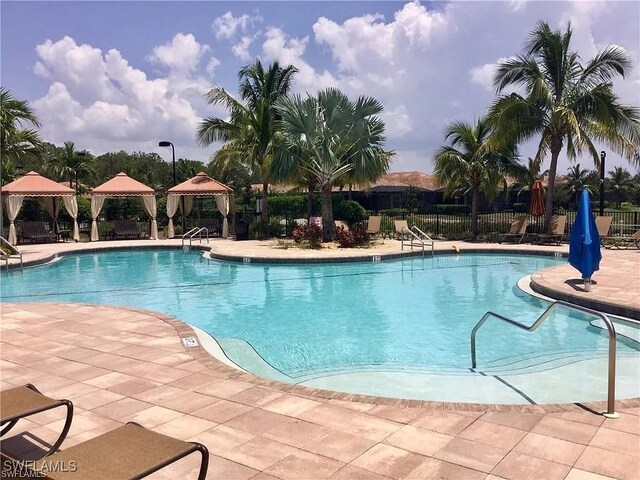 view of pool with a gazebo and a patio