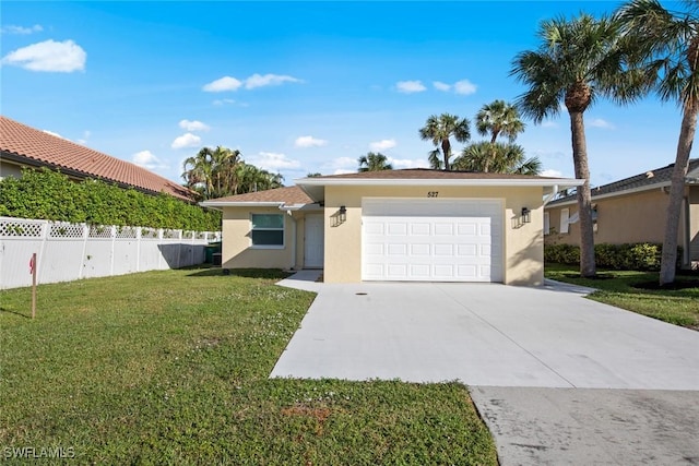 ranch-style house featuring stucco siding, an attached garage, and concrete driveway