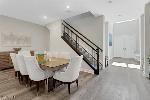 dining room featuring light wood-type flooring