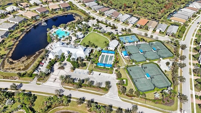 birds eye view of property featuring a residential view and a water view