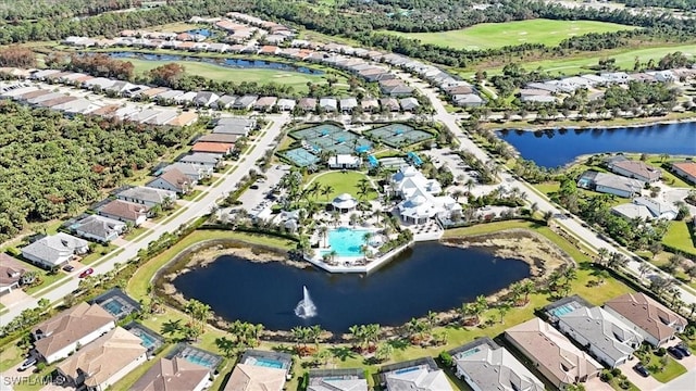 aerial view with a water view, view of golf course, and a residential view