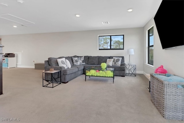 living room featuring light colored carpet