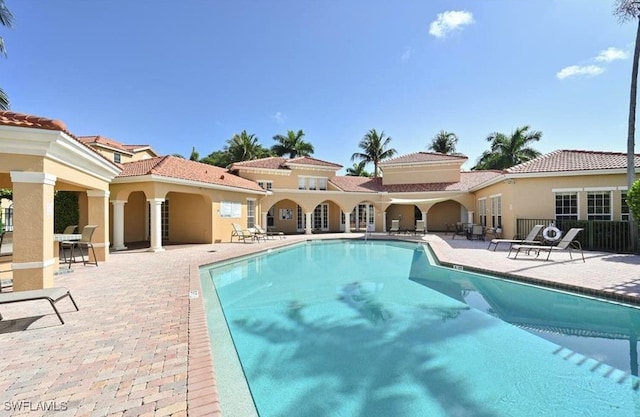 view of pool featuring a patio area