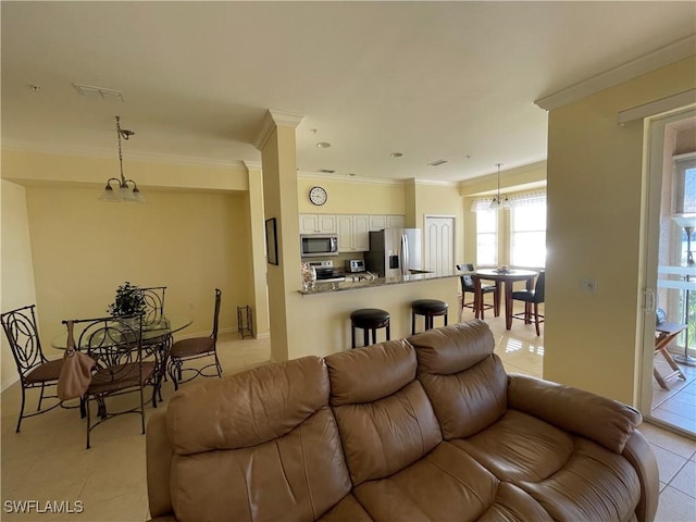 tiled living room with ornamental molding