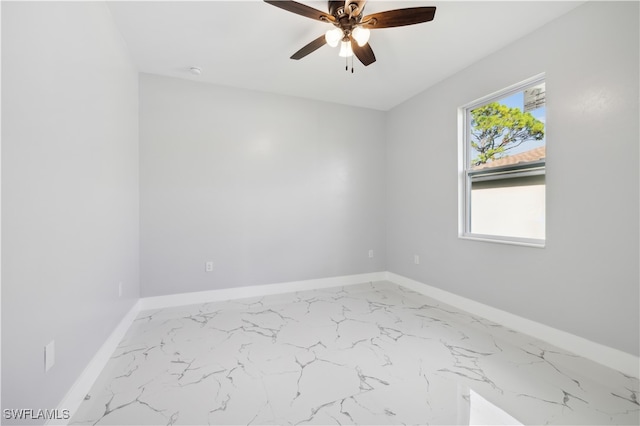 empty room featuring ceiling fan