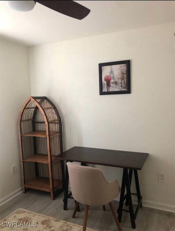 office area featuring hardwood / wood-style flooring and ceiling fan