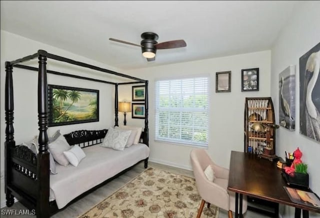 interior space featuring hardwood / wood-style floors and ceiling fan