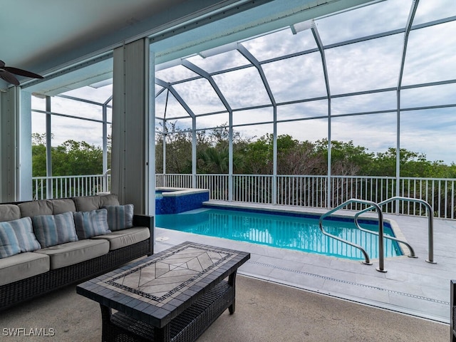 view of swimming pool featuring a patio, an outdoor living space, a lanai, and ceiling fan