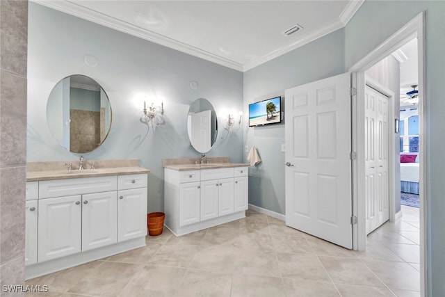 bathroom featuring vanity, ornamental molding, tile patterned flooring, and ceiling fan