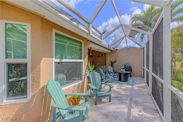 sunroom / solarium with lofted ceiling