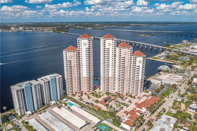 birds eye view of property with a water view