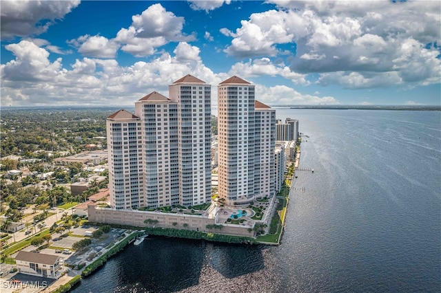 birds eye view of property featuring a water view