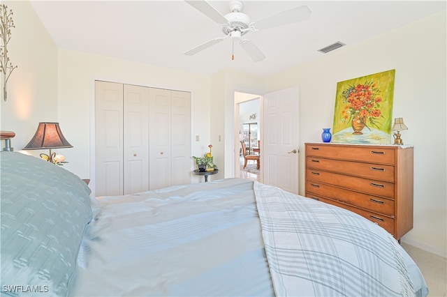 bedroom featuring a closet and ceiling fan