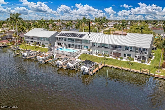 drone / aerial view with a water view