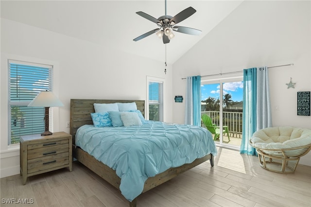 bedroom featuring access to outside, high vaulted ceiling, and ceiling fan