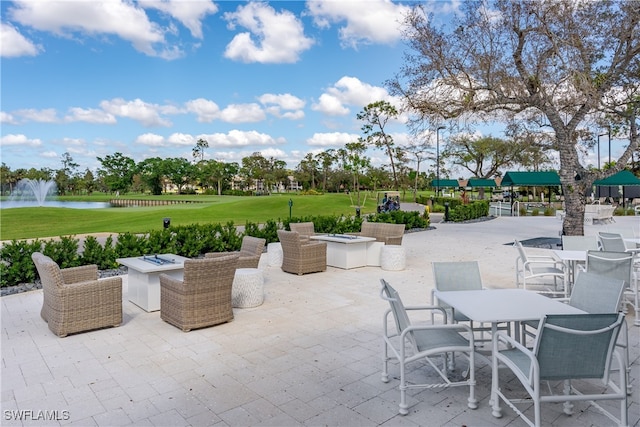 view of patio / terrace featuring a water view