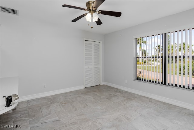 empty room with ceiling fan