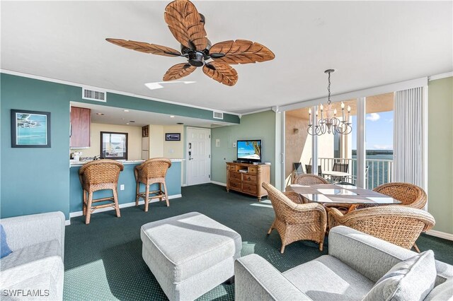 dining room with crown molding, visible vents, and baseboards