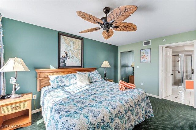 bedroom with baseboards, visible vents, a closet, and light colored carpet