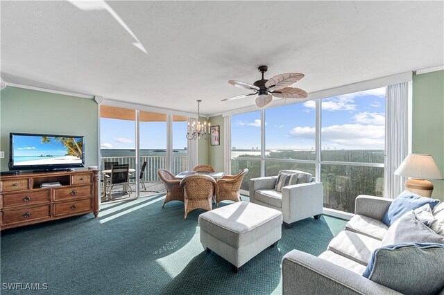 sunroom with ceiling fan with notable chandelier