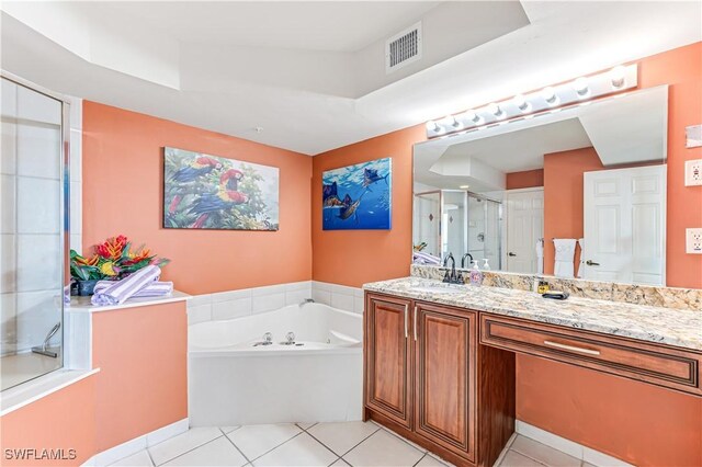 full bath featuring visible vents, a stall shower, vanity, tile patterned flooring, and a bath