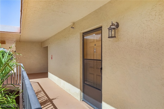 doorway to property with a balcony