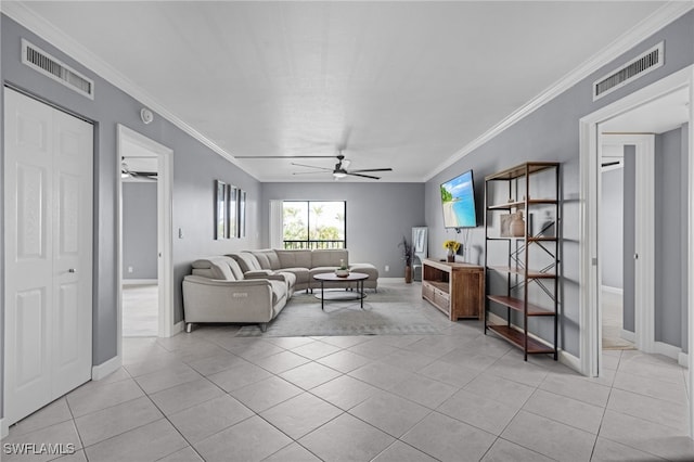 tiled living room with crown molding and ceiling fan