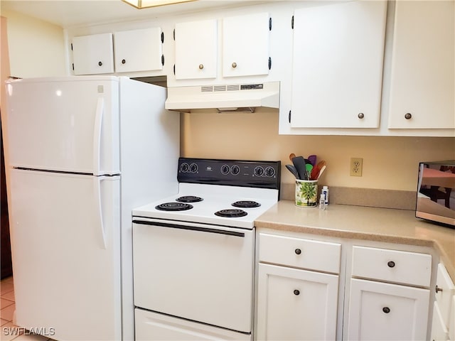 kitchen with range hood, white cabinets, tile patterned floors, and white appliances