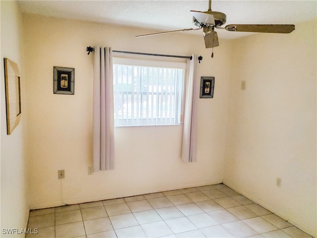 unfurnished room with ceiling fan