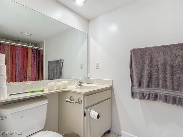 800 Misty Pines Cir Unit H-201, Naples, FL 34105 - bathroom with vanity, toilet, and tile patterned floors