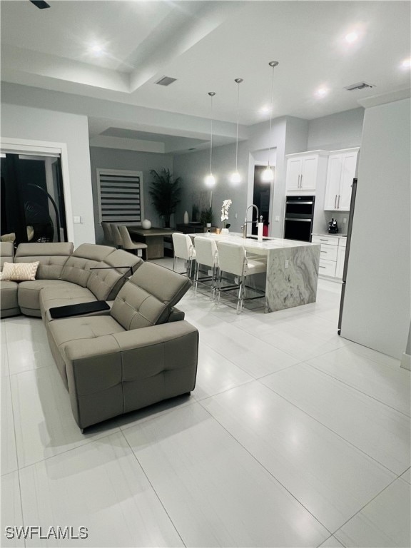 tiled living room with sink