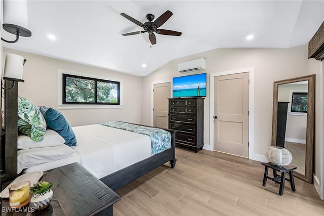 bedroom with light wood-type flooring, a wall mounted AC, lofted ceiling, and ceiling fan