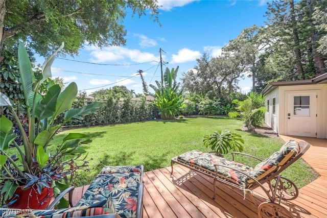 view of yard with a wooden deck