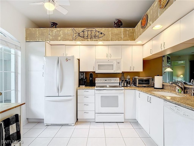 162 Newport Dr Unit 1202, Naples, FL 34114 - kitchen with white appliances, a sink, white cabinetry, ceiling fan, and light tile patterned floors