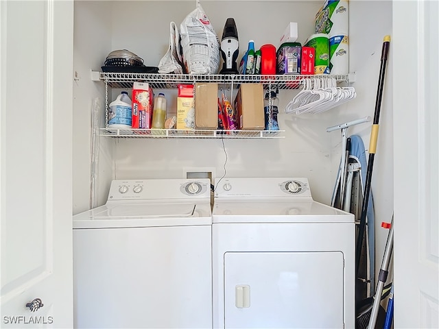 washroom with washer and clothes dryer