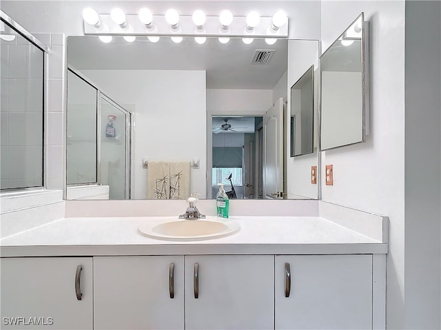 bathroom featuring vanity and walk in shower