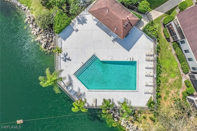 birds eye view of property featuring a water view