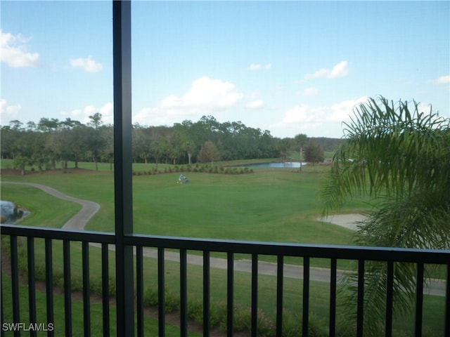 view of home's community with a lawn