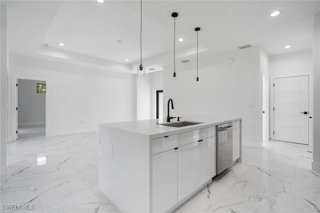 kitchen with dishwasher, a kitchen island with sink, sink, pendant lighting, and white cabinetry