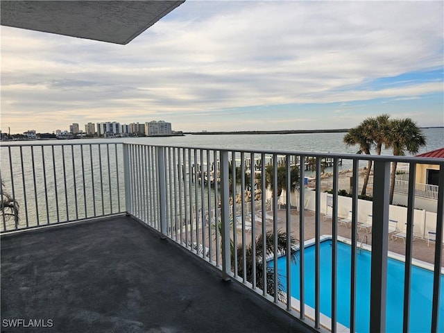 balcony featuring a water view