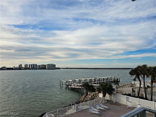 property view of water with a dock