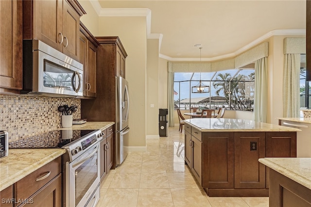 kitchen with appliances with stainless steel finishes, backsplash, light stone counters, ornamental molding, and a chandelier