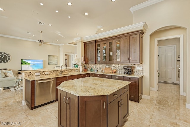 kitchen with sink, dishwasher, a kitchen island, kitchen peninsula, and crown molding