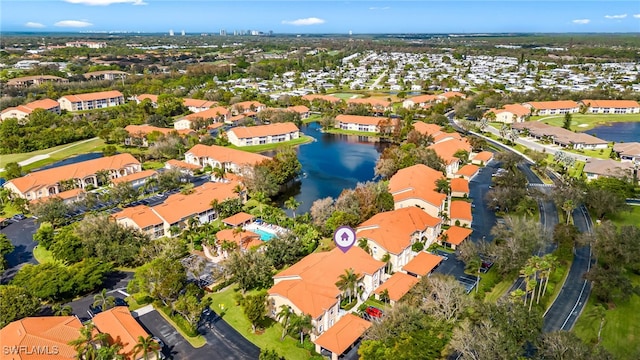 bird's eye view with a water view