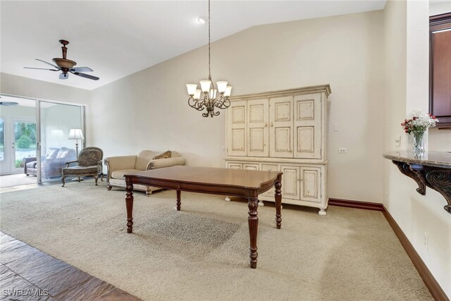 game room featuring lofted ceiling, carpet flooring, and ceiling fan with notable chandelier