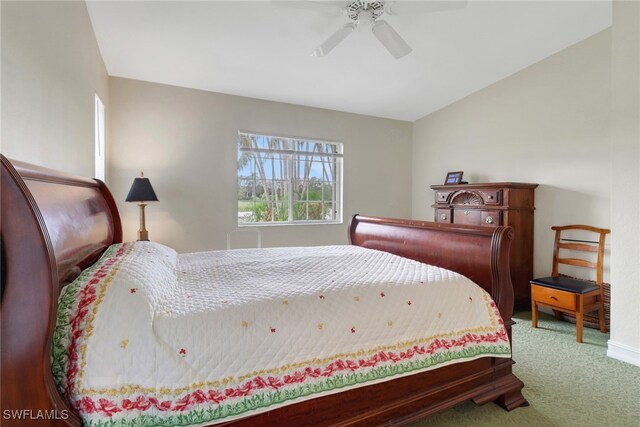 bedroom featuring carpet floors, ceiling fan, and vaulted ceiling