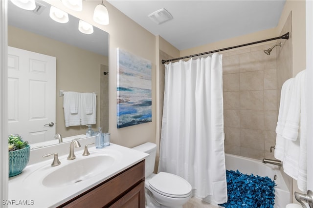 full bathroom featuring toilet, vanity, and shower / tub combo with curtain