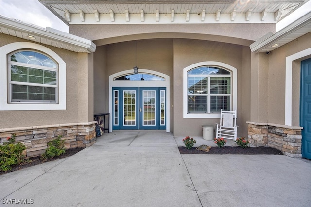 doorway to property with french doors